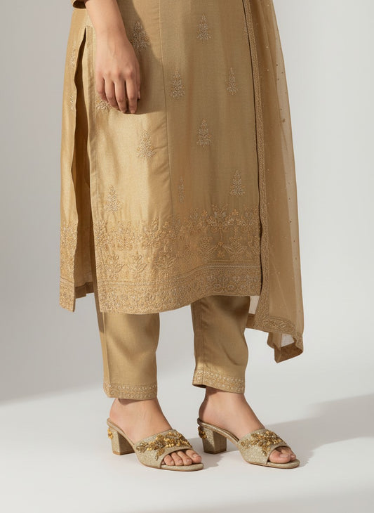My Store 2 gold glitter block heel slide sandals with crystal and bead embellishments worn with a matching ethnic outfit