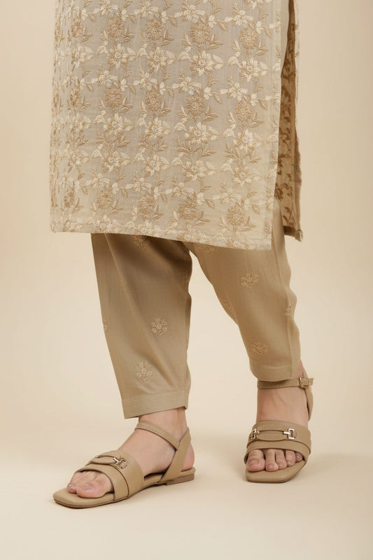My Store 2 beige square-toe flat sandals with ankle strap and metallic buckle detail worn with embroidered trousers
