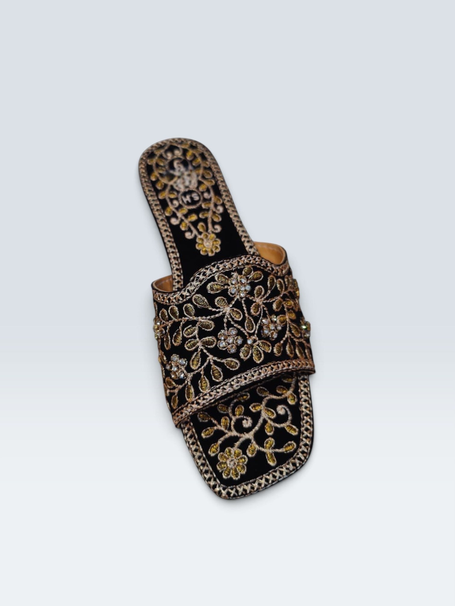 My Store 2 black velvet flat slide sandals with intricate gold floral embroidery and shimmering stone accents.