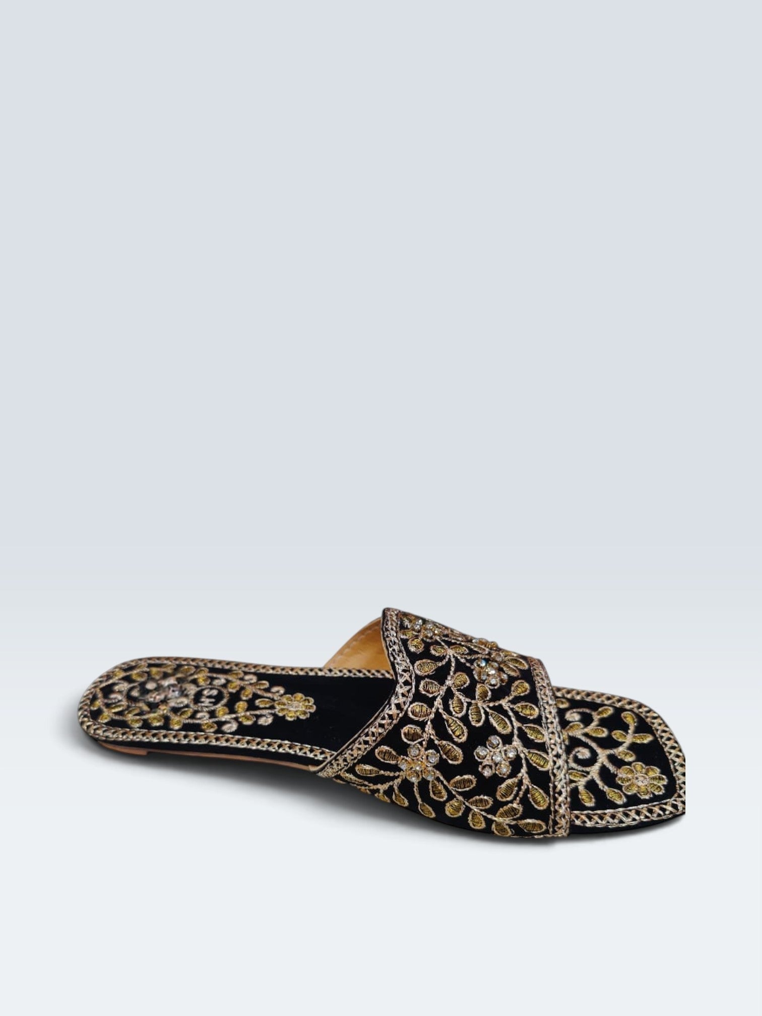 My Store 2 black velvet flat slide sandals featuring intricate gold floral embroidery and shimmering stone accents.