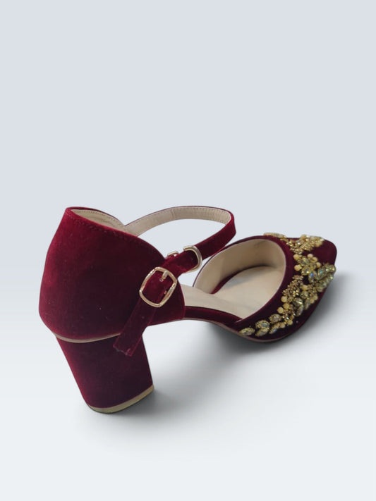 My Store 2 deep burgundy velvet block heel sandals with gold crystal floral embellishments and an ankle strap.