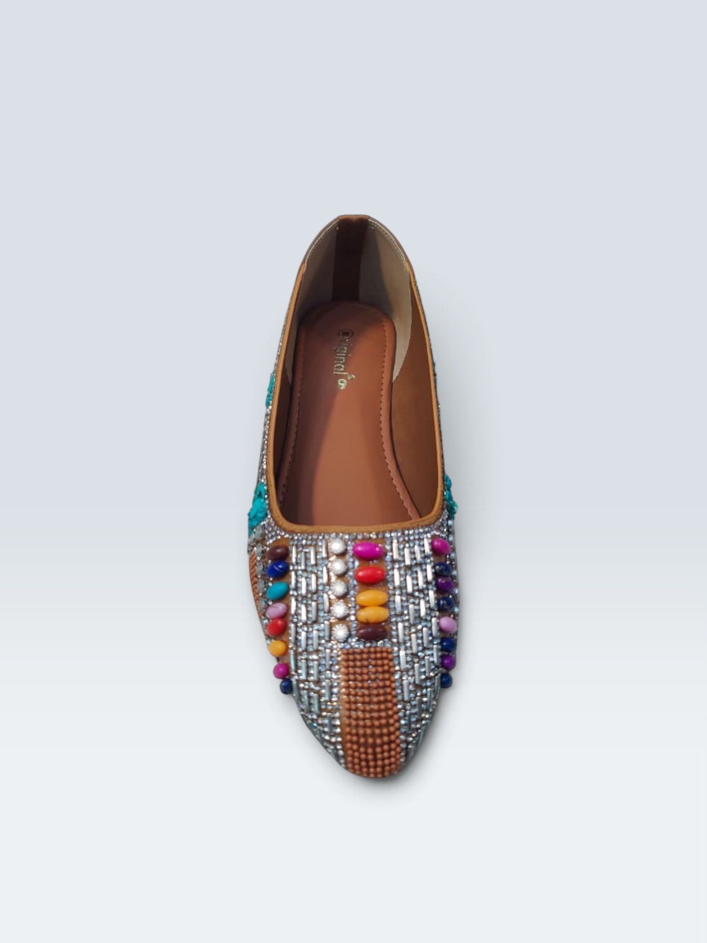 My Store 2 tan embellished flats featuring turquoise stones, crystals, and multi-colored beads in a traditional design.
