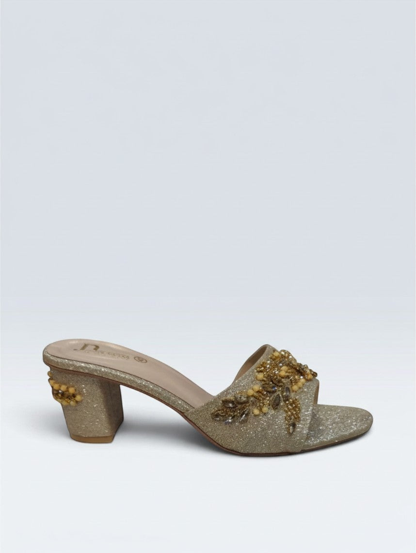My Store 2 gold glitter block heel slide sandals with crystal and bead embellishments on the strap and heel