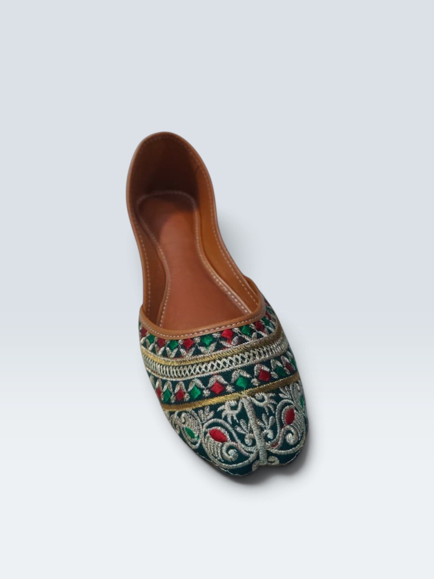 My Store 2 traditional green jutti flats featuring intricate multi-colored embroidery and gold threadwork details.