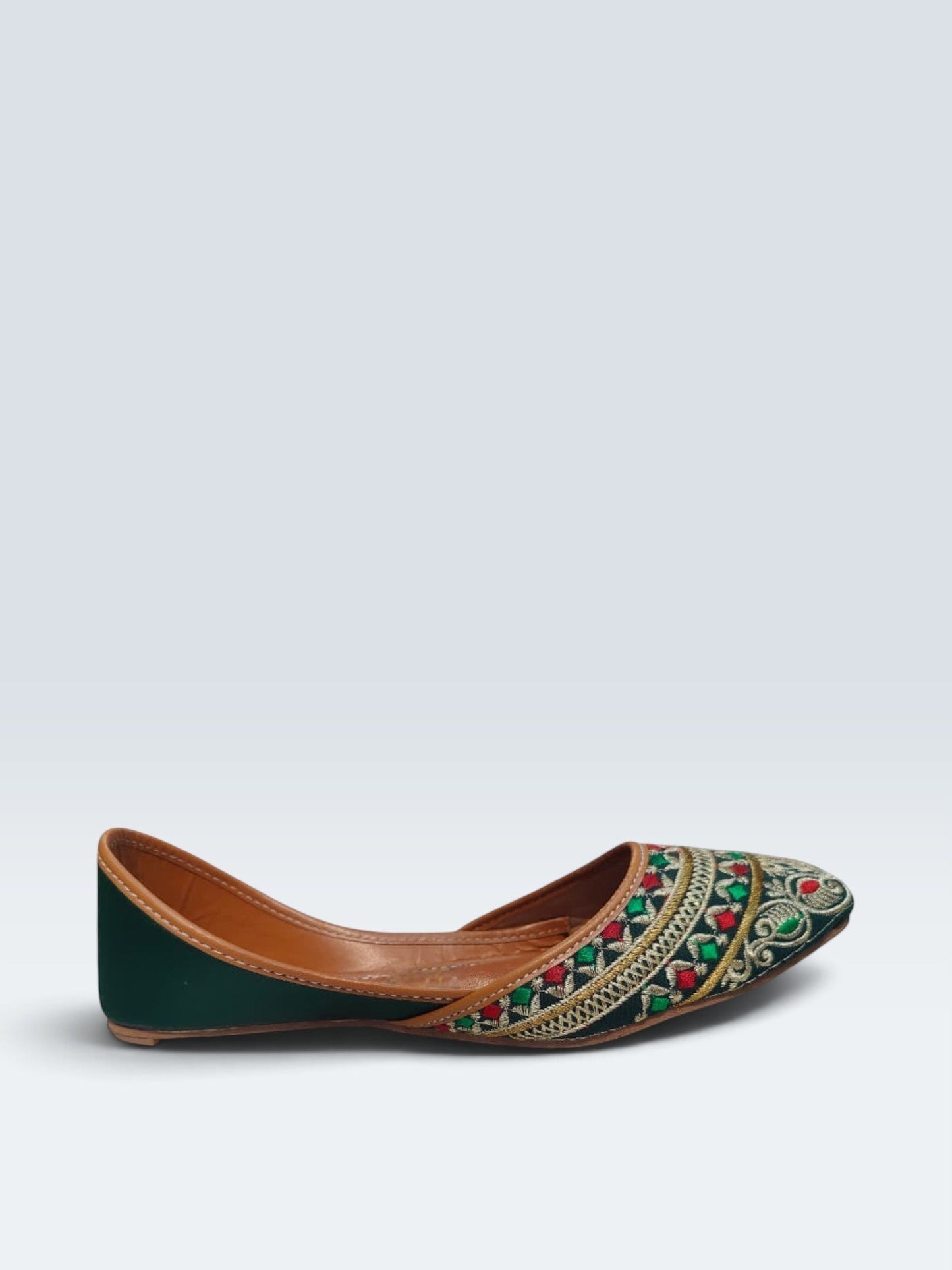 My Store 2 deep green traditional juttis with intricate multi-colored embroidery and gold threadwork details.