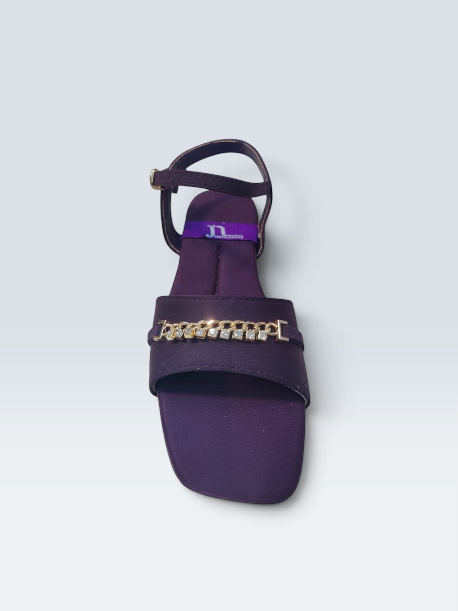 My Store 2 deep purple satin flat sandals with a square toe, gold chain, and crystal embellishment on the front strap.
